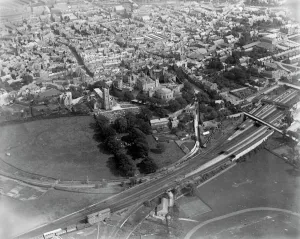 Prints of LANCASTER, Lancashire. Aerial view of Lancaster with the Castle, church and railway station. Lancaster Castle houses the Shire Hall and County Court and until 2011 it was used as a prison Railways – Tracks, Stations and Steam Transport: Lancaster Castle Print, 12th-century castle keep and surrounding buildings