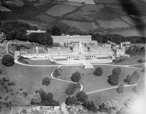 Prints of ROYAL NAVAL COLLEGE, Dartmouth, Devon, photographed in 1928. This officer training college was purpose built on this site in 1905 to a design by Sir Aston Webb Transport and Waterways in England - Railways, Canals and Roads: Aerial photograph print of the Royal Naval College, Dartmouth