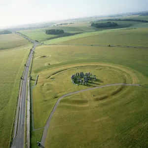 Prints of STONEHENGE, Wiltshire. Aerial view of the site showing roads looking east Aerial View Prints: Aerial Print of Stonehenge from the East