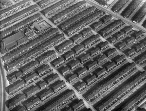 Prints of Serried ranks of close-packed working class housing in Leeds, West Yorkshire, photographed in 1928. By the 1930s much of Leeds Victorian housing stock were regarded as slums House And Home Prints: Terraced houses Print, 1928 aerial view