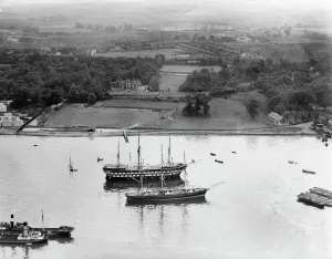 Prints of Greenhithe, Kent. The Cutty Sark tea clipper and HMS Worcester berthed outside Ingress Abbey (the Incorporated Thames Nautical Training College). Photographed in May 1939 by Aerofilms Ltd Transport and Waterways in England - Railways, Canals and Roads: Print of the Cutty Sark tea clipper and HMS Worcester at Greenhithe, Kent
