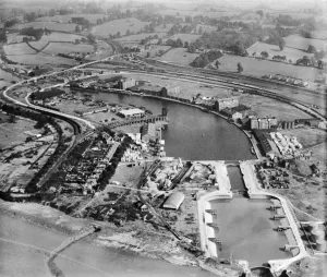 South-West England - Aerial Views: Sharpness Docks Print: Aerial view of a tidal basin and canal entrance