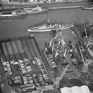 <b class=qtipBold><figcaption>Albion Dockyard EAW061875</figcaption></b><br>HMS Loch Dunvegan moored at the Albion Dockyard, Bristol. Photographed by Aerofilms Ltd in November 1955.<br><em>© Historic England Archive</em> Albion Dockyard EAW061875