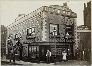 <b class=qtipBold><figcaption>Angel Inn AL0144_080_01</figcaption></b><br>The Angel Inn, Highgate, London. Situated only five miles from Westminster and the City of London, and the meeting place of several roads, the village of Highgate was a convenient stopover place. It had five inns by 1552 and 21 in 1841. The Angel, an inn from the 17th century, has experienced several transformations in its time. One of two albumen prints, this one from 1882.<br><em>© Historic England</em> Angel Inn AL0144_080_01