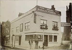 <b class=qtipBold><figcaption>Angel Inn AL0144_080_04</figcaption></b><br>The Angel Inn, Highgate, London. Situated only five miles from Westminster and the City of London, and the meeting place of several roads, the village of Highgate was a convenient stopover place. It had five inns by 1552 and 21 in 1841. The Angel, an inn from the 17th century, has experienced several transformations in its time. One of two albumen prints, this one c. 1874.<br><em>© Historic England</em> Angel Inn AL0144_080_04