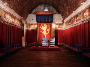 Prints of DOVER CASTLE, Kent. Interior view of the Kings Hall showing Henry II recreated throne Castle Prints: Dover Castle Kings Hall Print