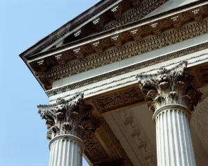 Prints of CHISWICK HOUSE, London. View looking up at two of the Corinthian capitals and part of the pediment of the entrance portico. Palladian style Historic Landmark Prints: Chiswick House Print: Corinthian Capitals and Pediment