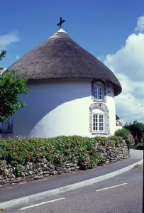 Prints of RIGHT ROUND HOUSE, Veryan Green, VERYAN, CORNWALL. The Right Round House, viewed from the south-west Architecture in England - Historic and Modern Buildings: Print of Veryan's Right Round House in Cornwall