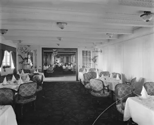 <b class=qtipBold><figcaption>B saloon, RMS Olympic BL24990_040</figcaption></b><br>The annexe of B saloon, RMS Olympic, White Star Line, 1920-21. The Olympic was sister ship to the ill-fated Titanic and Britannic. This Bedford Lemere and Company photograph was commissioned by the White Star Line, which was also known as the Oceanic Steam Navigation Company, and was probably taken at Southampton docks.<br><em>© Historic England Archive</em> B saloon, RMS Olympic BL24990_040