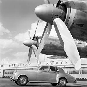 Heathrow Airport Collection: Bentley car and aircraft propellers a087923