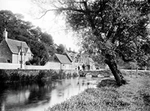 <b class=qtipBold><figcaption>Bibury CC72_00847</figcaption></b><br>BIBURY, Gloucestershire. Looking along the river towards the stone bridge beside Arlington Row. The Cotswold village of Bibury was described as the most beautiful village in England by William Morris. Photographed in 1906 by Henry Taunt.<br><em>© Historic England</em> Bibury CC72_00847