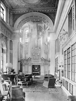 <b class=qtipBold><figcaption>Blenheim Palace CC49_00046</figcaption></b><br>BLENHEIM PALACE, Woodstock, Oxfordshire. Interior view. The beautiful organ standing at one end of the Long Library, installed by the eighth Duke in 1891. The library is decorated with stucco work and hung with portraits of the Royal Family and the Marlboroughs. Photographed in 1912 by Henry Taunt.<br><em>© Historic England</em> Blenheim Palace CC49_00046
