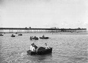 <b class=qtipBold><figcaption>Boating WSA01_01_07979</figcaption></b><br>West End Pier, Marine Road West, Morecambe, Lancashire. A view of West End Pier from across the Children's Boating Pool. 1925-1930. Walter Scott.<br><em>© Historic England Archive</em> Boating WSA01_01_07979