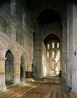 <b class=qtipBold><figcaption>Brinkburn Priory K030534</figcaption></b><br>BRINKBURN PRIORY, Northumberland. Interior view of the church looking towards the stained glass window at the East end.<br><em>© Historic England</em> Brinkburn Priory K030534