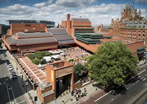 <b class=qtipBold><figcaption>British Library DP183911</figcaption></b><br>The British Library, 96 Euston Road, Kings Cross, Camden, London. Colin St John Wilson architect. Construction started in1982 and completed in 1997. Eduardo Paolozzi's bronze statue based on William Blake's study of Isaac Newton can be seen in the courtyard. View from south west.<br><em>© Historic England Archive</em> British Library DP183911