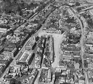 <b class=qtipBold><figcaption>Bury St Edmunds EPW001749</figcaption></b><br>BURY ST EDMUNDS, Suffolk. Aerial view of the marketplace, Bury St Edmunds. Photographed in June 1920. Aerofilms Collection (see Links). EPW001749<br><em>© Historic England</em> Bury St Edmunds EPW001749