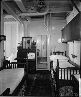 <b class=qtipBold><figcaption>Cabin suite, RMS Olympic BL24990_032</figcaption></b><br>The "Bibby" cabin suite D23, RMS Olympic, White Star Line, 1920-21. The Olympic was sister ship to the ill-fated Titanic and Britannic. This Bedford Lemere and Company photograph was commissioned by the White Star Line, which was also known as the Oceanic Steam Navigation Company, and was probably taken at Southampton docks.<br><em>© Historic England Archive</em> Cabin suite, RMS Olympic BL24990_032