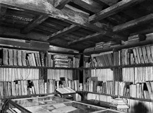 <b class=qtipBold><figcaption>Chained Library CC78_00195</figcaption></b><br>Wimborne Minster, Dorset. The chained library was founded in 1686 and was one of the first public libraries in the country. Photographed in July 1898 for the London Midland and Scottish Railway. Chained Library CC78_00195