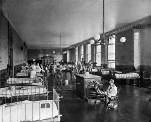 <b class=qtipBold><figcaption>Children's ward BL12177</figcaption></b><br>THE HOSPITAL FOR SICK CHILDREN, Great Ormond Street, London. Interior of the Clarence Ward showing nurses and children. The Hospital for Sick Children later became known as Great Ormond Street Hospital. Photographed for the secretary of the hospital by Bedford Lemere and Co. in May 1893.<br><em>© Historic England</em> Children's ward BL12177