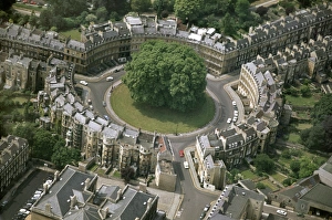 <b class=qtipBold><figcaption>The Circus, Bath JEH_22026_35a</figcaption></b><br>The Circus, Bath. The Circus was built by John Wood the elder in 1754-8. It was an original and innovative design, bending terraces of housing into tight curves. Photographed by Jim Hancock in July 1969.<br><em>© Historic England Archive</em> The Circus, Bath JEH_22026_35a