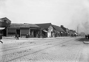 <b class=qtipBold><figcaption>Cleggs shop CC76_00072</figcaption></b><br>Thornton Road, Manningham, Bradford. A view looking east along the north side of Thornton Road from the corner with Ingelby Road, showing William Clegg's fruit and fish shop. Photographed in the 1890s for the London Midland and Scottish Railway.<br><em>© Historic England Archive</em> Cleggs shop CC76_00072