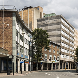<b class=qtipBold><figcaption>Corporation Street DP164674</figcaption></b><br>Corporation Street, Coventry, West Midlands. General view from the south west showing the Coventry Evening Telegraph building and New Oxford House.<br><em>© Historic England</em> Corporation Street DP164674