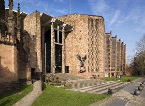 <b class=qtipBold><figcaption>Coventry Cathedral N080725</figcaption></b><br>COVENTRY CATHEDRAL, West Midlands. View from the south east showing Jacob Epstein's sculpture ' St Michael's Victory over the Devil '.<br><em>© Historic England</em> Coventry Cathedral N080725