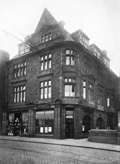 <b class=qtipBold><figcaption>Employment Exchange JLP01_01_113_16</figcaption></b><br>Victoria Viaduct, Carlisle, Cumbria. View of the front of the Employment Exchange and R. D. Hewitt & Co ironmongers. Photographed in 1907. John Laing Collection.<br><em>© Historic England Archive</em> Employment Exchange JLP01_01_113_16