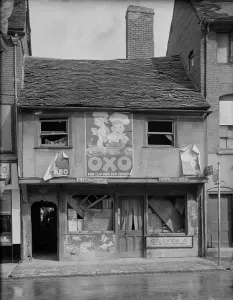 Prints of The bomb damaged front elevation of 4 Gosford Street, Coventry. Photographed by G B Mason, 1941. Oxo poster advertisement Historic Images 1920s To 1940s Prints: Print of Coventry 1941: Damaged Gosford Street Building
