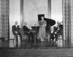 Prints of The Cecil Moon Quartet posed on a stage at The Royal Baths, Crescent Road, Harrogate, North Yorkshire. 1939. Walter Scott Collection Music Prints: Print of the Cecil Moon Quartet at The Royal Baths, Harrogate