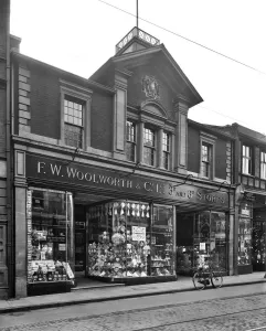 Prints of F W Woolworth And Company Limited, Kingston Upon Thames, Greater London. The front of the Kingston-upon-Thames branch of F W Woolworth and Co Ltd (Woolworths) 3d and 6d stores Historic Images 1920s To 1940s Prints: Print of Woolworths Kingston-upon-Thames Store, 1920