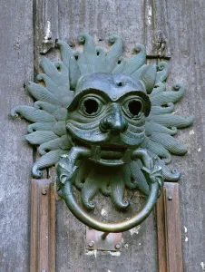 Prints of DURHAM CATHEDRAL, County Durham. Cathedral Sanctuary knocker in the shape of a mask Durham Prints: Durham Cathedral Sanctuary Mask Print
