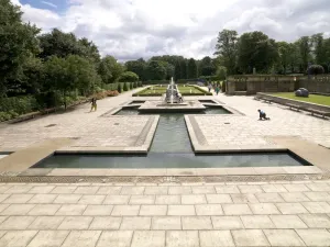 Prints of Mughul Gardens, Lister Park, Manningham, Bradford, West Yorkshire. A public park in the style of a Moghul garden. Looking along the water gardens to the south Bradford Prints: Mughal Garden Print, Lister Park Water Feature