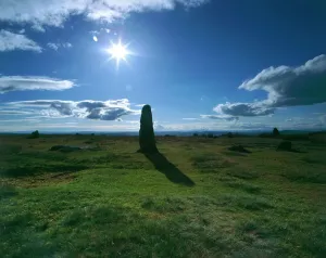 Prints of MITCHELLs FOLD STONE CIRCLE, Shropshire. View looking into the sun with stone silhouetted against the sky Shropshire Prints: Mitchell's Fold Stone Circle Print