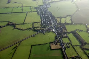 Prints of Hockliffe, Bedfordshire. The Roman road of Watling Street provides the principle axis, with roads to Woburn (to the left) and Leighton Buzzard (to the right) Bedfordshire Prints: Watling Street Print: Hockliffe Road Network