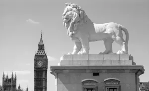 Tower Prints: Print of Coade Lion with Big Ben in the background, a photograph on paper