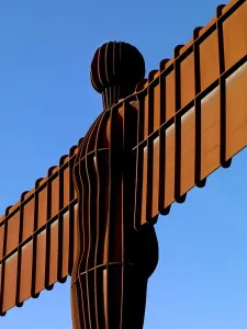 Prints of THE ANGEL OF THE NORTH, Gateshead, Tyne and Wear. Detailed view of Antony Gormleys statue Modern Art Piece Prints: Print of the Angel of the North, a large steel sculpture in Gateshead