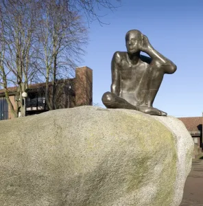Prints of Maygrove Peace Park, Kilburn, Borough of Camden, Greater London. Antony Gormley sculpture Untitled (Listening) from south east. Photographed by Chris Redgrave in 2016 Sculpture Prints: Gormley's Untitled (Listening) Print