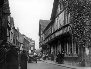<b class=qtipBold><figcaption>Friar Street OP04407</figcaption></b><br>Friar Street, Worcester. Street view with pedestrians and a car approaching on the road. Photographed by J E Ray in July 1930.<br><em>© Historic England Archive</em> Friar Street OP04407