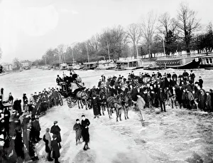 <b class=qtipBold><figcaption>Frozen Thames CC72_00707</figcaption></b><br>RIVER THAMES near Oxford, Oxfordshire. A crowd of people and horse drawn carriages standing on the frozen River Thames, with barges moored against the bank in the background. Photographed in February 1895 by Henry Taunt.<br><em>© Historic England</em> Frozen Thames CC72_00707