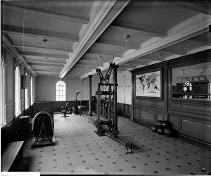 <b class=qtipBold><figcaption>Gymnasium, RMS Olympic BL24990_015</figcaption></b><br>The gymnasium, RMS Olympic, White Star Line, 1920-21. The Olympic was sister ship to the ill-fated Titanic and Britannic. This Bedford Lemere and Company photograph was commissioned by the White Star Line, which was also known as the Oceanic Steam Navigation Company, and was probably taken at Southampton docks.<br><em>© Historic England Archive</em> Gymnasium, RMS Olympic BL24990_015