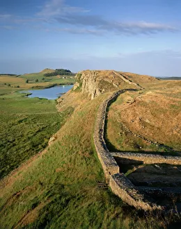 <b class=qtipBold><figcaption>Hadrian's Wall J060258</figcaption></b><br>HADRIAN'S WALL, Northumberland. Hadrian's Wall and Milecastle 39 looking east towards Crag Lough. hadrian<br><em>© Historic England</em> Hadrian's Wall J060258