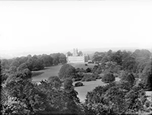 <b class=qtipBold><figcaption>Highclere CC72_01042</figcaption></b><br>Highclere Castle, Highclere, Hampshire. The exterior of the south side of the castle, remodelled in an Elizabethan style in 1839-42, taken from the surrounding parkland. Photographed by Henry Taunt, late 19th century.<br><em>© Historic England Archive</em> Highclere CC72_01042