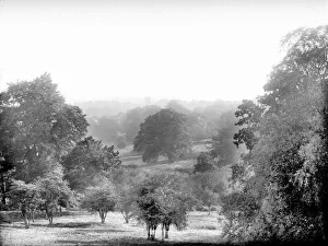 <b class=qtipBold><figcaption>Highclere CC72_01047</figcaption></b><br>Highclere Castle, Highclere, Hampshire. A view of the parkland surrounding the house, taken from the Rotunda. Photographed by Henry Taunt, late 19th century.<br><em>© Historic England Archive</em> Highclere CC72_01047