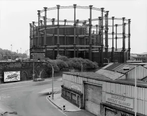 Prints of Goods Way in Kings Cross showing the premises of Baldwins Covent Garden in the foreground and gas holders behind. Photographed by Paul Barkshire, 24th October 1981. Gasometer Industry and Agriculture in England - Factories, Farming and Production: Print of Gas Holders, Kings Cross