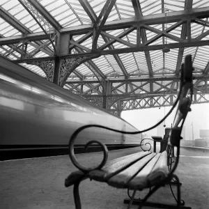 Waterloo Station Prints: Waterloo Station Print: A Platform Scene with Passing Train