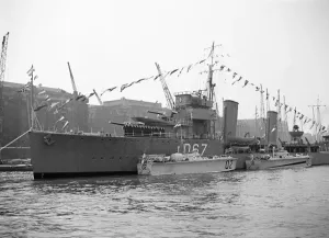 Prints of HMS WISHART, Hays Wharf, Bermondsey, London. A Thorneycroft modifed W class destroyer launched in 1919, here bedecked in celebratory bunting Malta Prints: Print of HMS Wishart, a Thorneycroft modified W-class destroyer