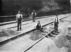 Prints of BODMIN ROAD STATION, St Winnow, Cornwall. Four tracklayers at work Railways – Tracks, Stations and Steam Transport: Bodmin Road Station Track Repairs Print