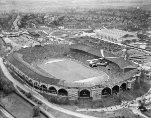 Prints of WEMBLEY STADIUM, London. An aerial view of the Wembley Cup Final 1935 Transport and Waterways in England - Railways, Canals and Roads: Wembley Stadium Aerial Print 1935