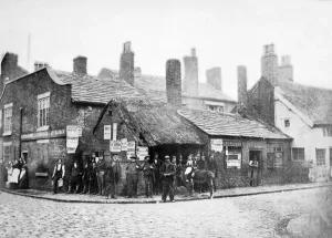 Prints of OLD SMITHY, Junction of Market Street and Bradshawgate, Leigh, Greater Manchester. This photograph was taken the day before the Old Smithy was demolished Victoriana Prints: Print of Old Smithy, Leigh, 6 May 1863